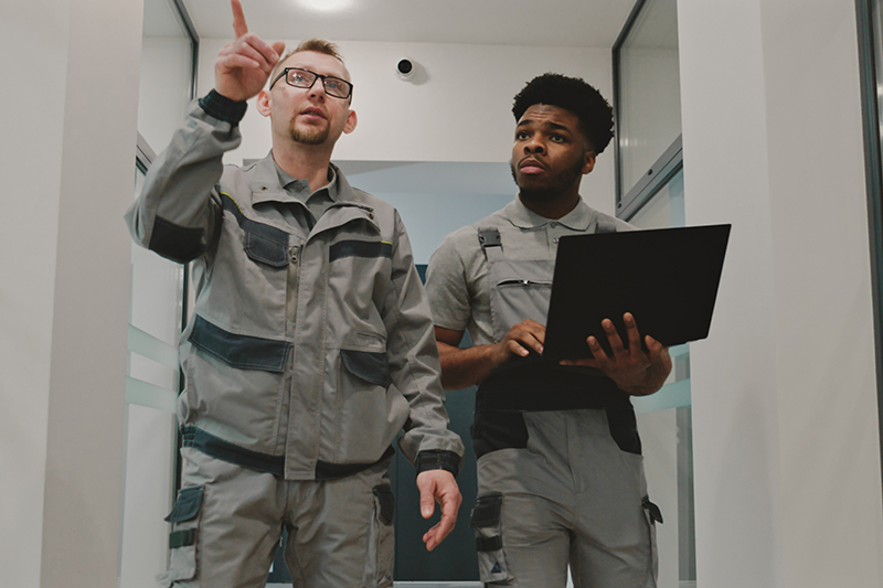 Technicians checking the business site